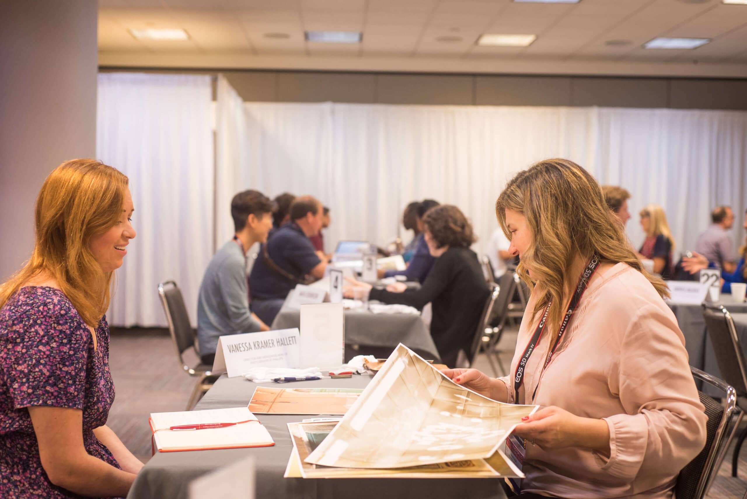 PPE Taking notes -Photo Plus Expo: X Reasons You Should go if You Love Photography