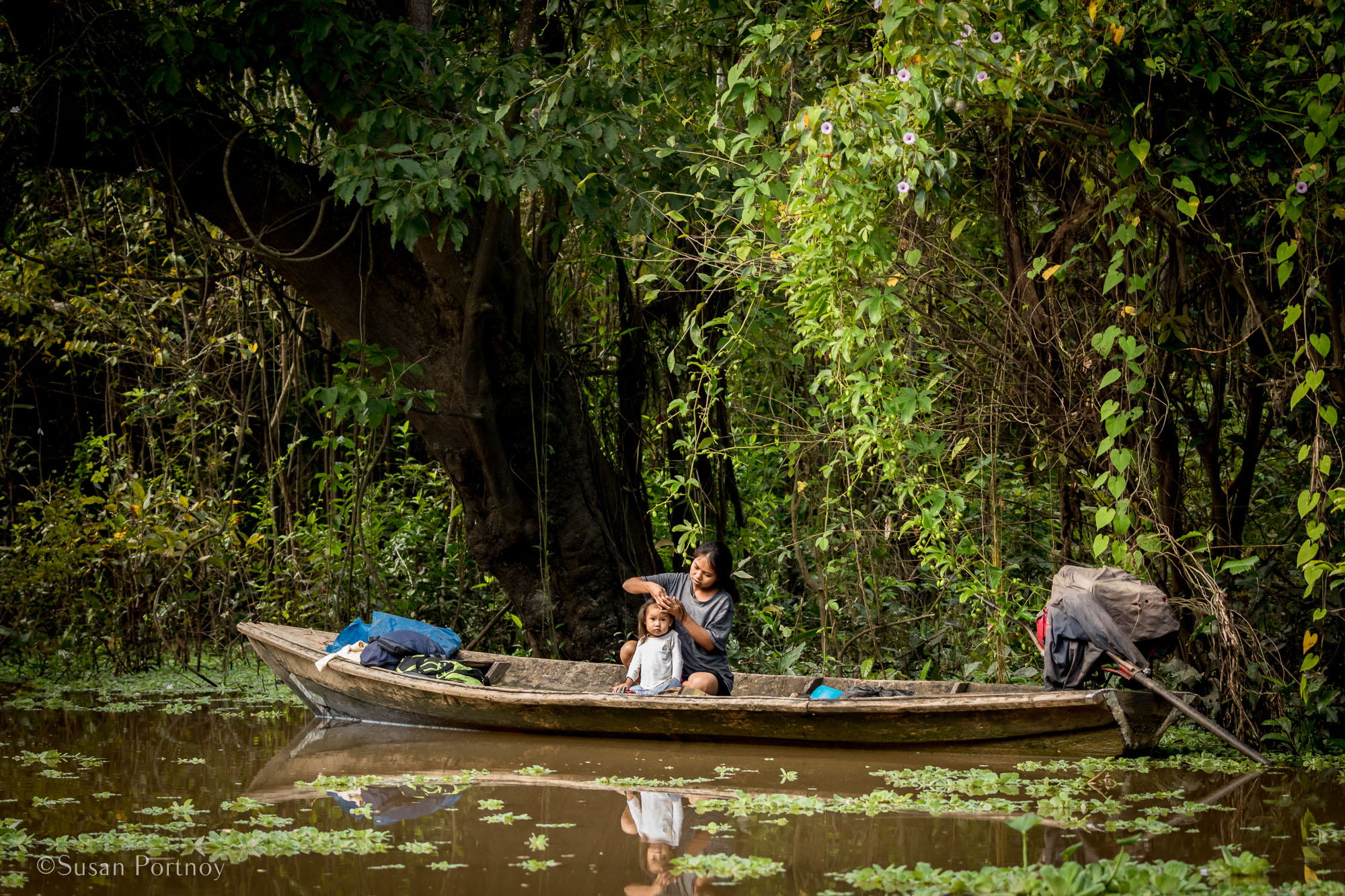 Woman in a boat | 6 Things to love about a luxury River Cruise on the Amazon -0855